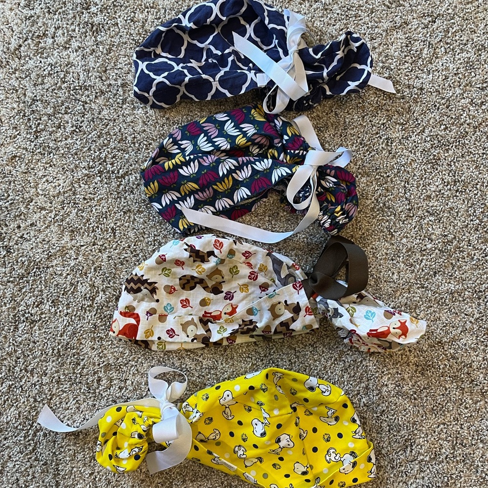 Womens scrub hats. Ponytail style with ribbon tie. Like new condition.